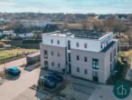 Modern wohnen mit Komfort: Hochwertige Eigentumswohnung mit Balkon und Aufzug in Heiligenhafen - Außenaufnahme